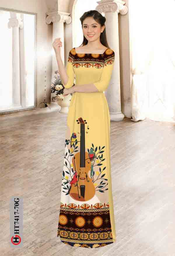 Vai ao dai hinh dan violin va hoa van thiet